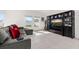 Bright living room has a large sectional and built-in entertainment center at 350 Rustic Rail Dr, Lake Wales, FL 33859