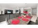 Open-concept living space shows dining room, living room, and kitchen at 350 Rustic Rail Dr, Lake Wales, FL 33859