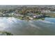 Aerial view of lakeside condos with a pool and docks at 402 E Orlando Ave # 18C, Ocoee, FL 34761