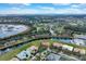 Beautiful aerial view of a home nestled alongside a tranquil canal, showcasing its prime waterfront location at 4036 Bougainvillea Pl, Kissimmee, FL 34746