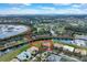 Beautiful aerial view of a home nestled alongside a tranquil canal, showcasing its prime waterfront location at 4036 Bougainvillea Pl, Kissimmee, FL 34746