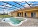 A screened-in pool with brick pavers offers an inviting outdoor retreat at 4036 Bougainvillea Pl, Kissimmee, FL 34746