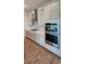 Modern kitchen featuring stainless steel appliances and stylish backsplash at 4110 Gooseberry Trl, Kissimmee, FL 34746