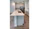 Spacious kitchen island with sink, faucet, and stylish countertops at 4110 Gooseberry Trl, Kissimmee, FL 34746