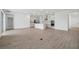Spacious open-concept living area with modern finishes, wood-look tile flooring and abundant light at 4110 Gooseberry Trl, Kissimmee, FL 34746