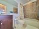 Clean bathroom includes a tiled tub/shower combination, toilet, and vanity at 4304 Clubside Dr # 4304, Longwood, FL 32779