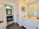 Bright bathroom features a vanity with modern fixtures and tile flooring at 4304 Clubside Dr # 4304, Longwood, FL 32779
