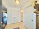 Bright foyer with tile flooring, double door closet, and access to other rooms in the unit at 4304 Clubside Dr # 4304, Longwood, FL 32779