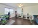 Bright living room boasts a ceiling fan and plenty of natural light at 4304 Clubside Dr # 4304, Longwood, FL 32779