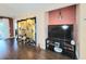 Living room showcasing hardwood floors, statement decor, and a decorative shoji screen at 4304 Clubside Dr # 4304, Longwood, FL 32779