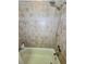 Tiled shower featuring upgraded shower head and neutral earth tone tiles at 4304 Clubside Dr # 4304, Longwood, FL 32779