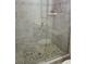 Modern shower with a glass door and tiled walls, offering a spa-like experience at 4304 Clubside Dr # 4304, Longwood, FL 32779