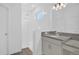 Stylish bathroom with a glass-enclosed shower, granite countertop and contemporary fixtures at 4472 Lions Gate Ave, Clermont, FL 34711