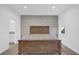 Clean bedroom showcasing neutral tones, an accent wall, and natural lighting at 4472 Lions Gate Ave, Clermont, FL 34711