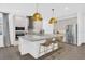 Open concept kitchen with stainless steel appliances, granite countertops, and island seating at 4472 Lions Gate Ave, Clermont, FL 34711