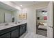 Bright bathroom with double vanity, modern fixtures, and stylish decor at 4532 Target Blvd, Kissimmee, FL 34746