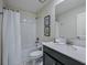 The bathroom features a shower-tub combination and a modern single sink vanity at 4532 Target Blvd, Kissimmee, FL 34746