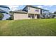 Spacious green backyard, perfect for Gathering activities and outdoor entertaining at 4770 Cains Wren Trl, Sanford, FL 32771