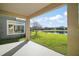 Scenic backyard with a pond view, providing a serene outdoor setting at 4770 Cains Wren Trl, Sanford, FL 32771