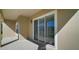 Outdoor patio with sliding glass doors, offering access to the home's interior at 4770 Cains Wren Trl, Sanford, FL 32771