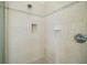 Shower featuring tile surround, a built-in niche, and designer trim at 4770 Cains Wren Trl, Sanford, FL 32771