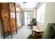 Sitting room featuring vintage furniture, natural light and a peaceful space for relaxation at 5016 Fawn Ridge Rd, Orlando, FL 32819