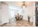 Charming dining room with a round table, wood chairs, and unique lighting at 520 E Anderson St, Orlando, FL 32801
