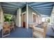 Inviting covered front porch with ample seating, perfect for relaxing and enjoying the outdoors at 520 E Anderson St, Orlando, FL 32801