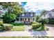 Charming two-story home with a well-maintained front yard and inviting porch at 520 E Anderson St, Orlando, FL 32801