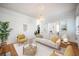 Sunlit living room features hardwood floors, neutral furniture, and modern decor at 520 E Anderson St, Orlando, FL 32801