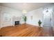 Spacious living room features hardwood floors, white walls, fireplace and natural light at 520 E Anderson St, Orlando, FL 32801