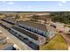 Aerial view of townhouses with solar panels at 6403 Cyrils Dr, St Cloud, FL 34771