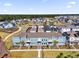 New community features blue townhomes, modern design and landscaping at 6403 Cyrils Dr, St Cloud, FL 34771
