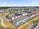 Aerial view of a neighborhood with a lake nearby at 6403 Cyrils Dr, St Cloud, FL 34771