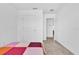 Bedroom featuring carpeting and a doorway to another room at 6403 Cyrils Dr, St Cloud, FL 34771