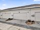 Attached two-car garage with concrete driveway at 6403 Cyrils Dr, St Cloud, FL 34771