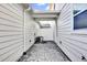 Back patio showing the white fence and air conditioning unit at 6403 Cyrils Dr, St Cloud, FL 34771