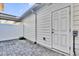 Private outdoor patio features brick pavers and a white fence for relaxing and entertaining guests at 6403 Cyrils Dr, St Cloud, FL 34771