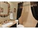 Bathroom featuring a vanity, framed mirror, and a walk-in shower at 873 Gulf Land Dr, Apopka, FL 32712