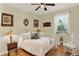 Bedroom with a bed, soft natural light, and neutral colors, creating a serene and inviting space at 873 Gulf Land Dr, Apopka, FL 32712
