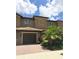 Charming two-story townhome with a well-manicured lawn and a convenient attached garage, with great curb appeal at 8950 Azalea Sands Ln # 8950, Champions Gate, FL 33896