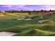Picturesque golf course featuring manicured greens, sand traps, and serene landscapes for an exceptional golfing experience at 8950 Azalea Sands Ln # 8950, Champions Gate, FL 33896
