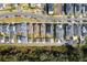 An aerial view shows well-maintained properties, manicured lawns, and a neatly planned neighborhood at 896 Tilden Oaks Trl, Winter Garden, FL 34787