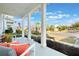 Inviting front porch view with comfortable seating, showcasing the neighborhood ambiance at 896 Tilden Oaks Trl, Winter Garden, FL 34787
