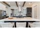 Bright kitchen featuring a large island, stainless steel appliances, and modern cabinetry at 896 Tilden Oaks Trl, Winter Garden, FL 34787
