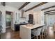 Well-designed kitchen featuring a spacious island, elegant cabinets, and modern finishes at 896 Tilden Oaks Trl, Winter Garden, FL 34787