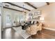 Bright living room with stylish furniture, wood floors, and plenty of natural light at 896 Tilden Oaks Trl, Winter Garden, FL 34787