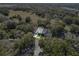 Aerial view of townhomes surrounded by lush greenery and tree cover at 923 Lexington Pkwy # 14, Apopka, FL 32712