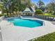 Inviting community pool with crystal clear water, surrounded by white fencing at 923 Lexington Pkwy # 14, Apopka, FL 32712