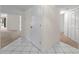 Bright foyer featuring tile floors, closet, and access to various rooms in the home at 923 Lexington Pkwy # 14, Apopka, FL 32712